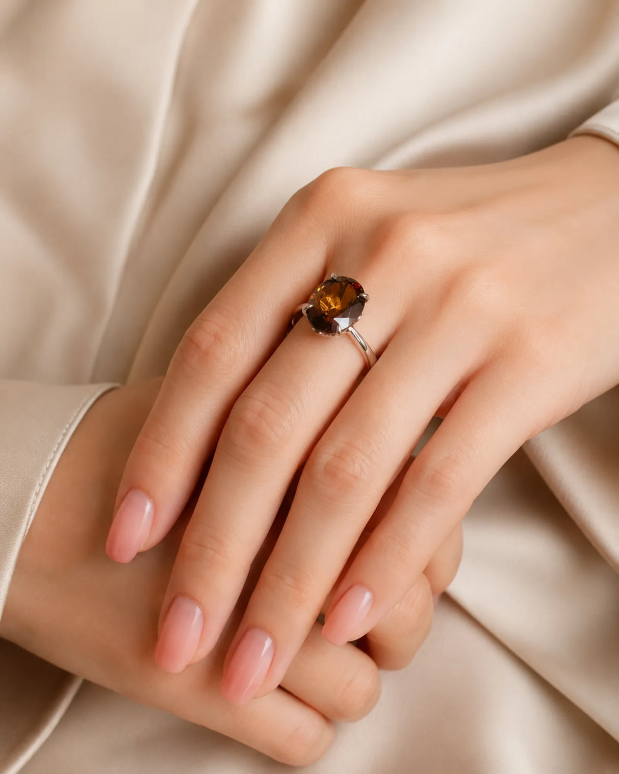 Champagne oval Imperial Topaz ring with four-prong setting and open floral basket in platinum | SARATTI
