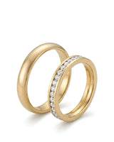 Channel set diamond wedding set with full eternity female band and comfort-fit male ring in 18K yellow gold - SARATTI