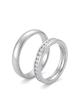 Channel set diamond wedding set with full eternity female band and comfort-fit male ring in polished platinum | SARATTI