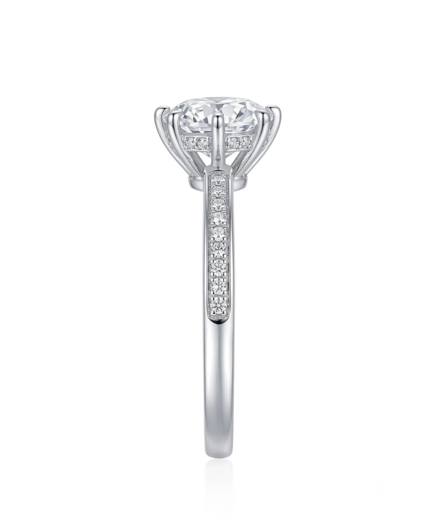 Classic round moissanite ring with pavé shoulders and platinum band | SARATTI