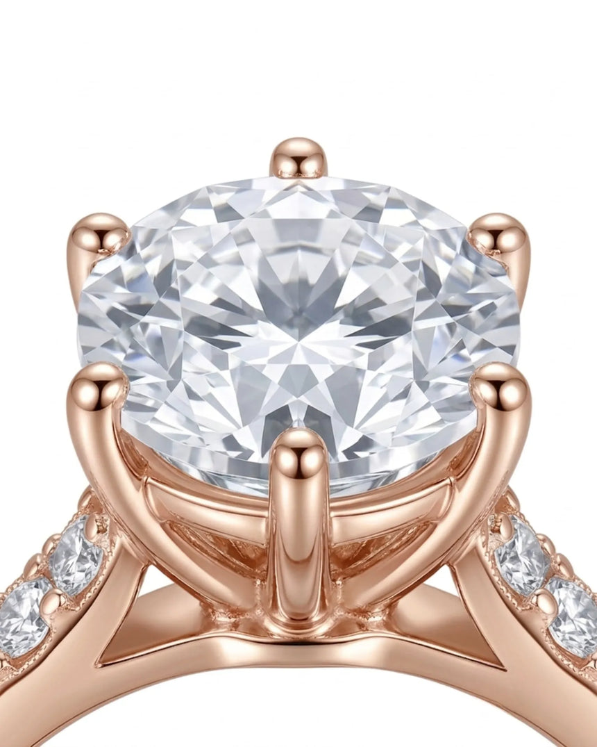 Classic round moissanite ring with polished band and pavé accents in rose gold | SARATTI