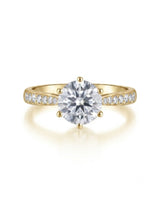 Classic round moissanite ring with polished band and pavé accents in yellow gold | SARATTI