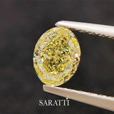 Close-up of 1.00 carat Natural Fancy Yellow oval diamond | SARATTI  
