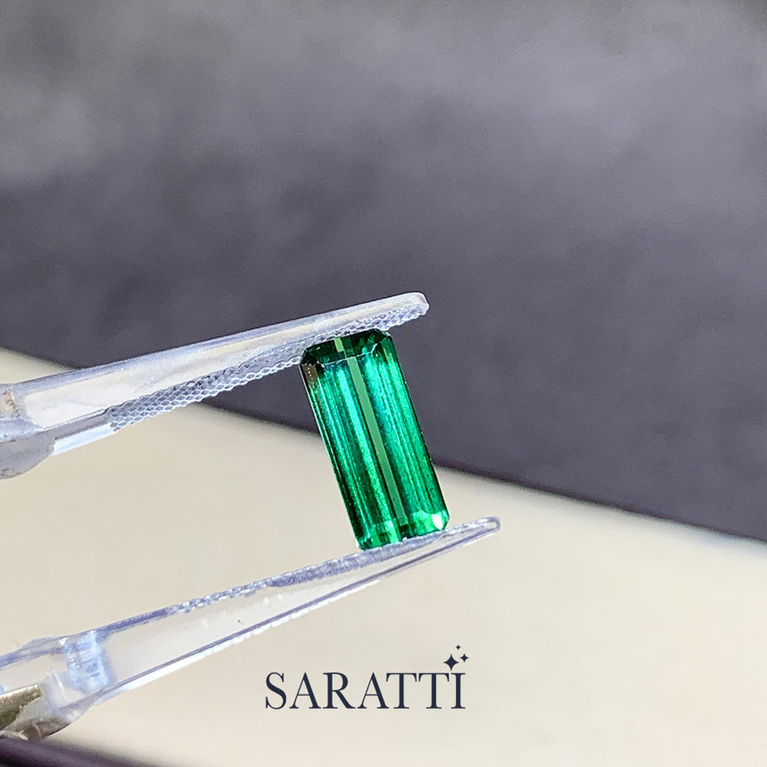 Close-up of 2.03 carat Natural tourmaline step cut emerald shape | SARATTI