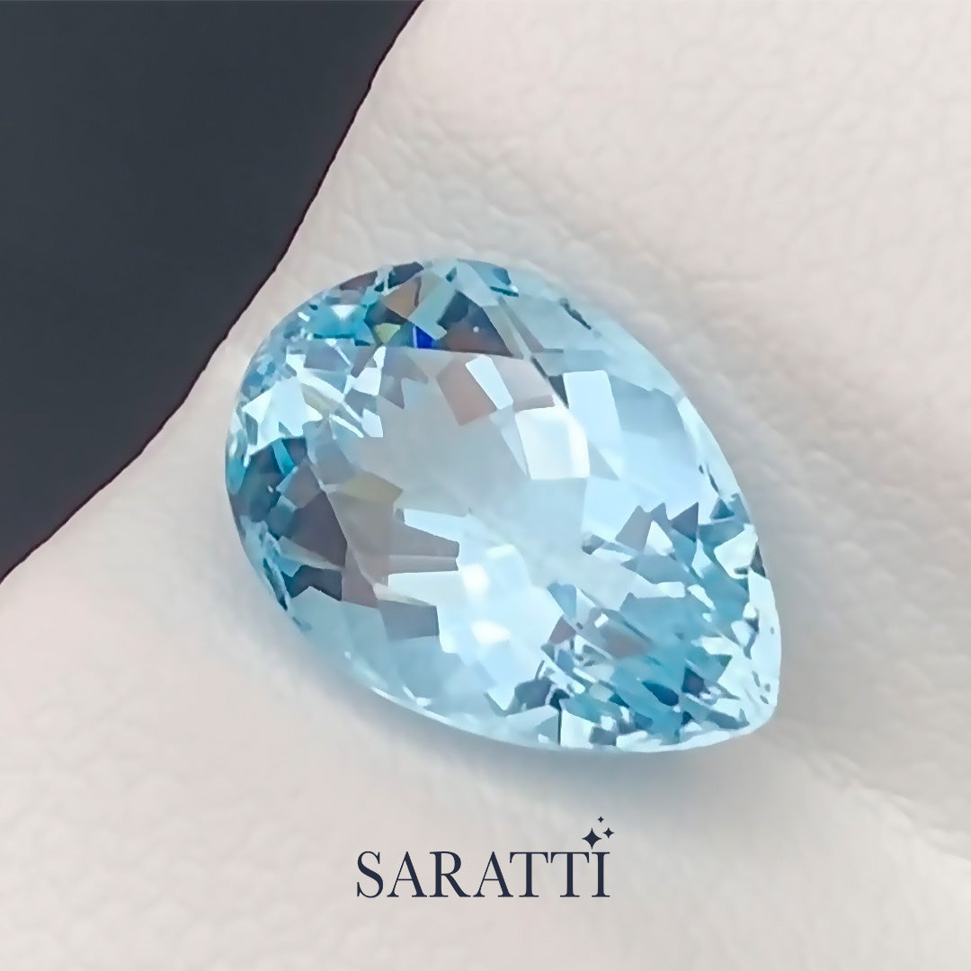 Close-up of 2.23 carat Natural aquamarine pear vivid blue tone | SARATTI