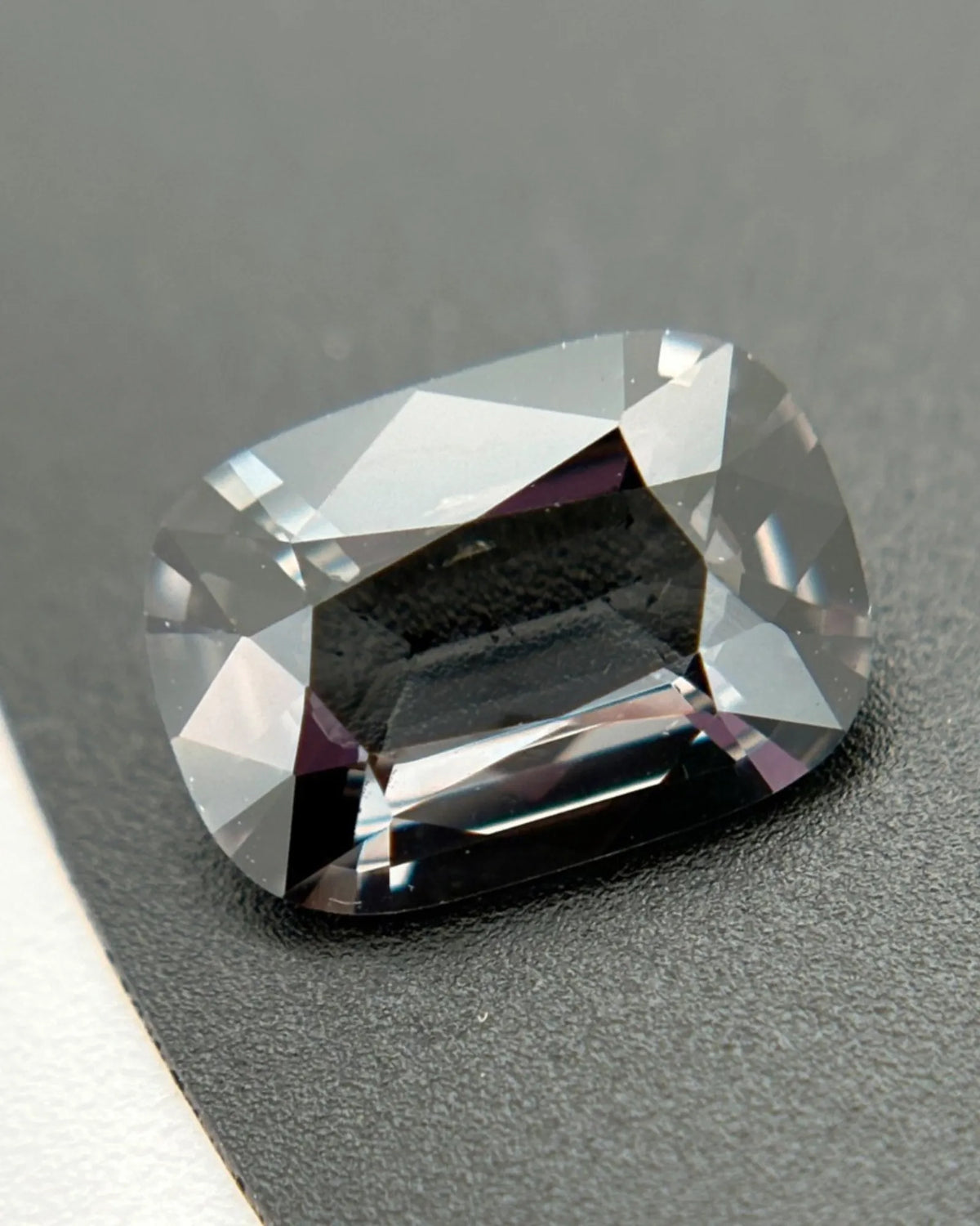 Close-up of 2.35ct Gray Spinel showing reflective facet structure | SARATTI