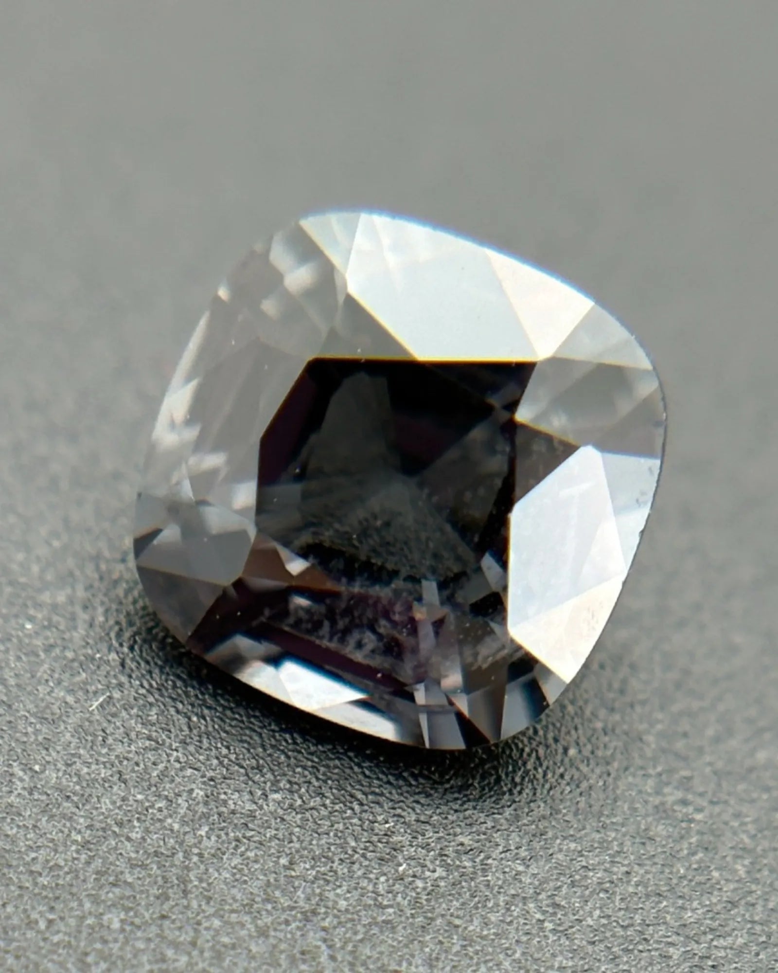Close-up of Burmese Gray Spinel showing metallic reflections | SARATTI