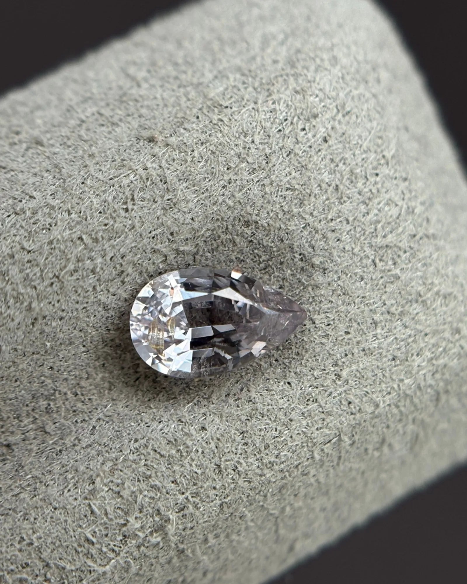 Close-up of Burmese Gray Spinel showing pear facet structure | SARATTI