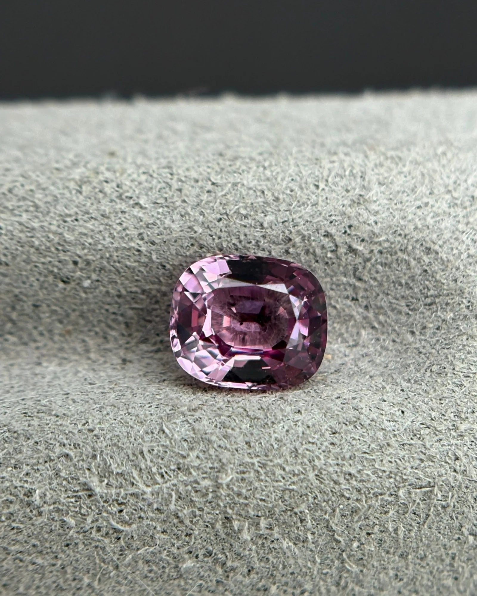 Close-up of Burmese Pink-Purple Spinel showing natural tonal variation | SARATTI