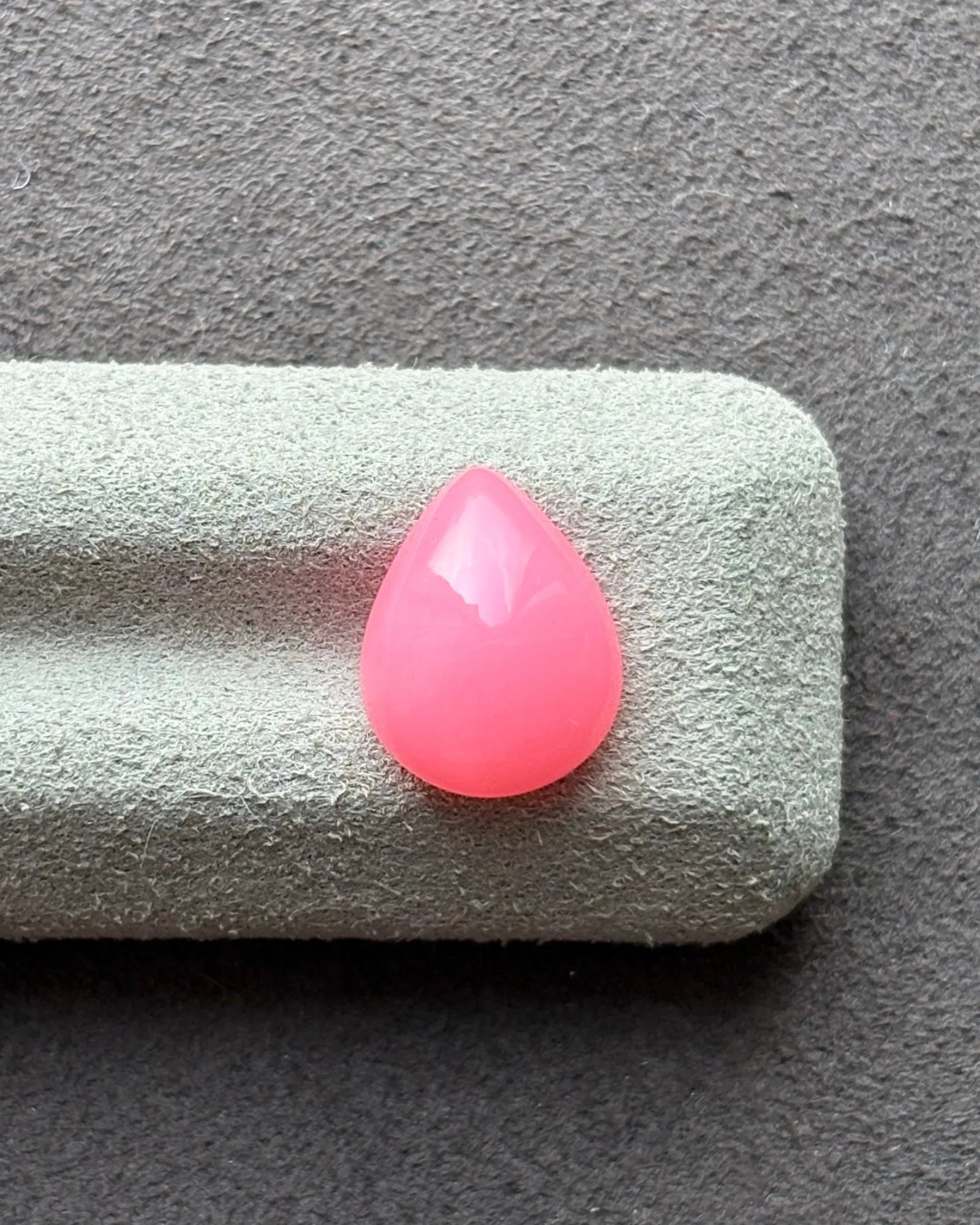 Close-up of Ethiopian Pink Opal showing smooth cabochon finish | SARATTI