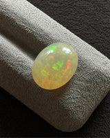 Close-up of Ethiopian White Opal multicoloured surface detail | SARATTI