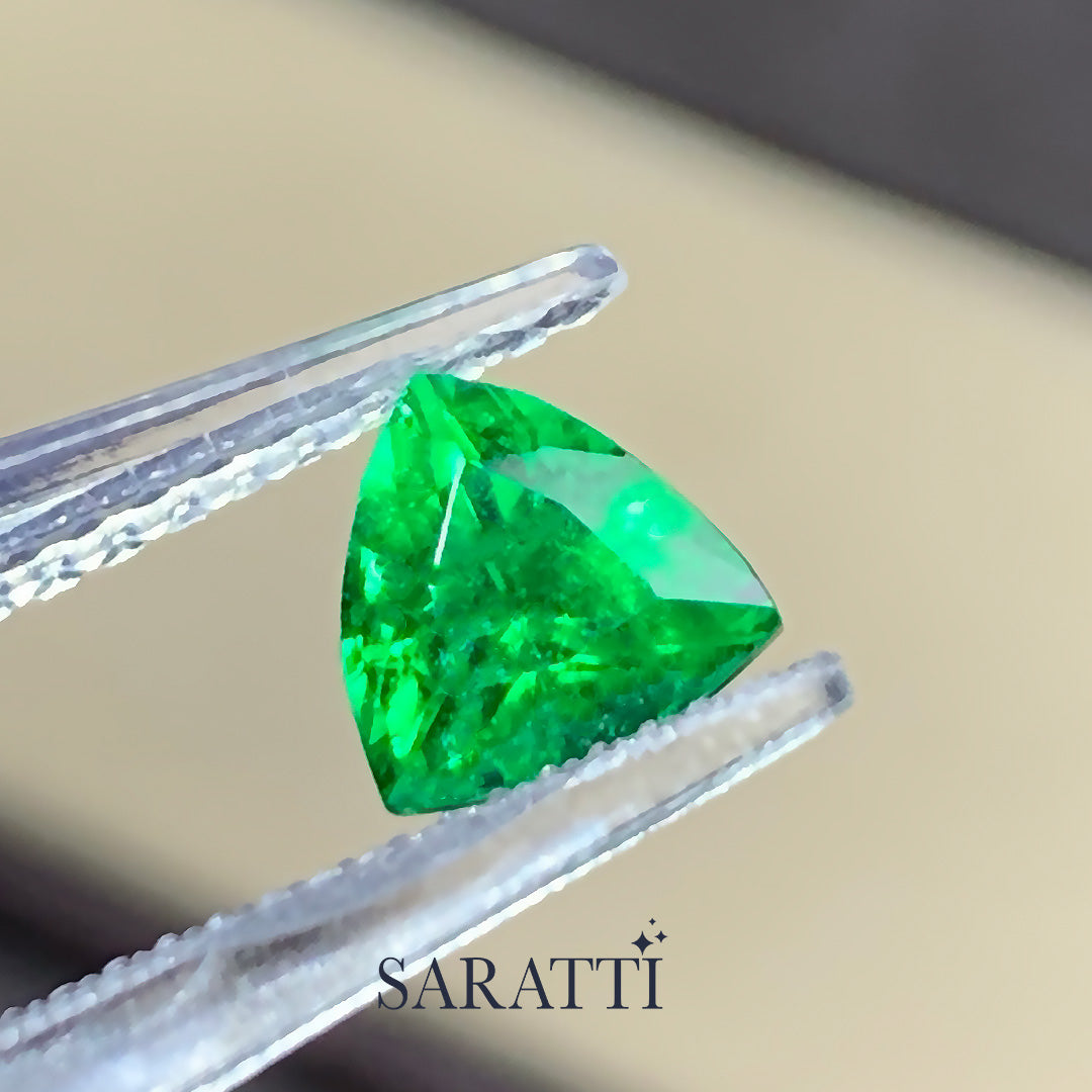 Close-up of Natural tsavorite garnet trillion brilliant faceting | SARATTI