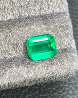 Close-up of Verdant Green Natural Emerald with clipped corners | SARATTI