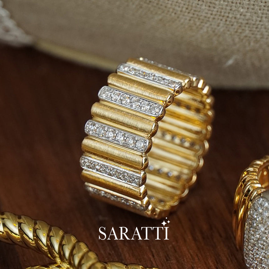 Close-up of gold ribbed band featuring diamond bar detailing, high jewelry craftsmanship | SARATTI