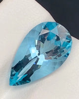 Close-up of modified brilliant Aquamarine facet reflections | SARATTI