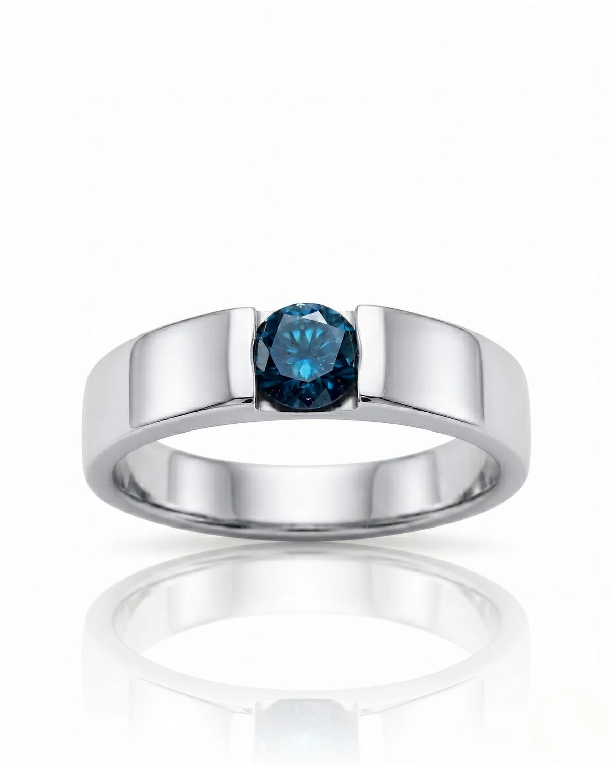 Close-up of round treated blue diamond secured without side stones in polished 18K white gold | SARATTI