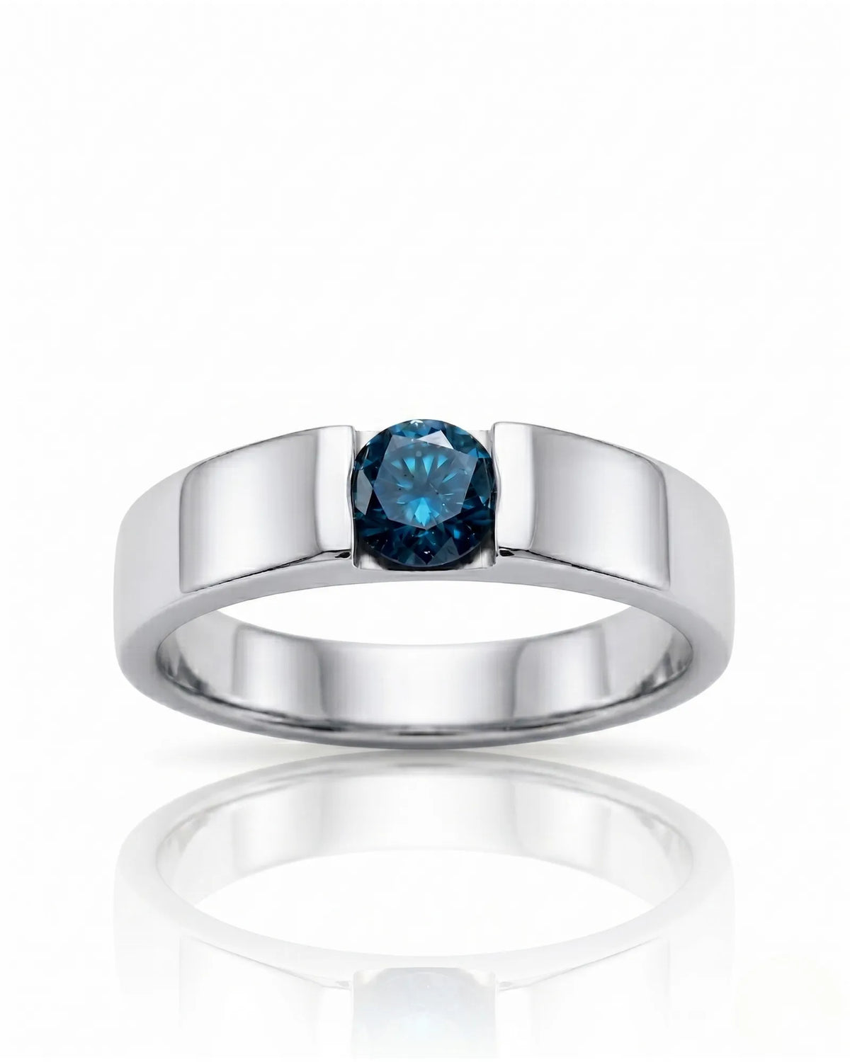 Close-up of round treated blue diamond secured without side stones in polished 18K white gold | SARATTI