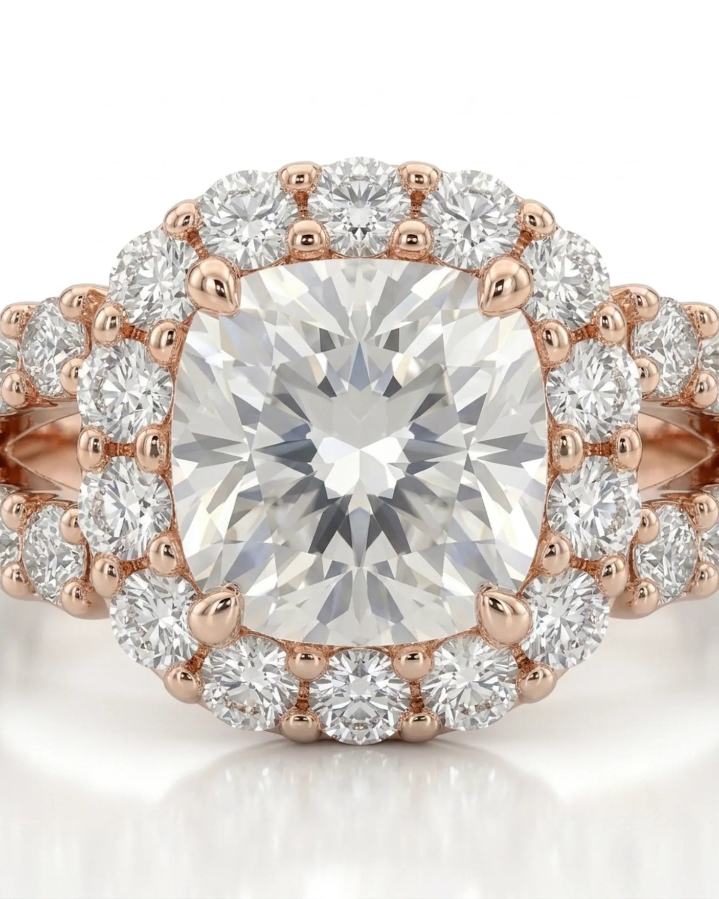 Colorless cushion moissanite framed by round stones with a coordinating rose gold eternity band | SARATTI