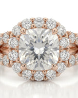 Colorless cushion moissanite framed by round stones with a coordinating rose gold eternity band | SARATTI