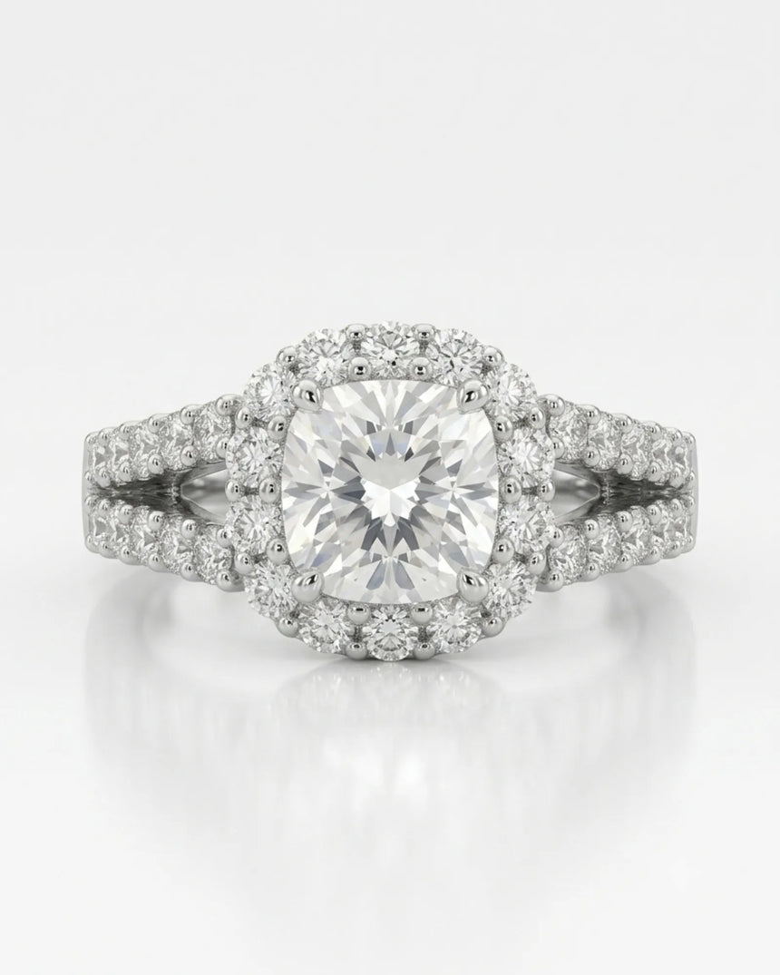 Colorless cushion moissanite framed by round stones with a coordinating white gold eternity band | SARATTI