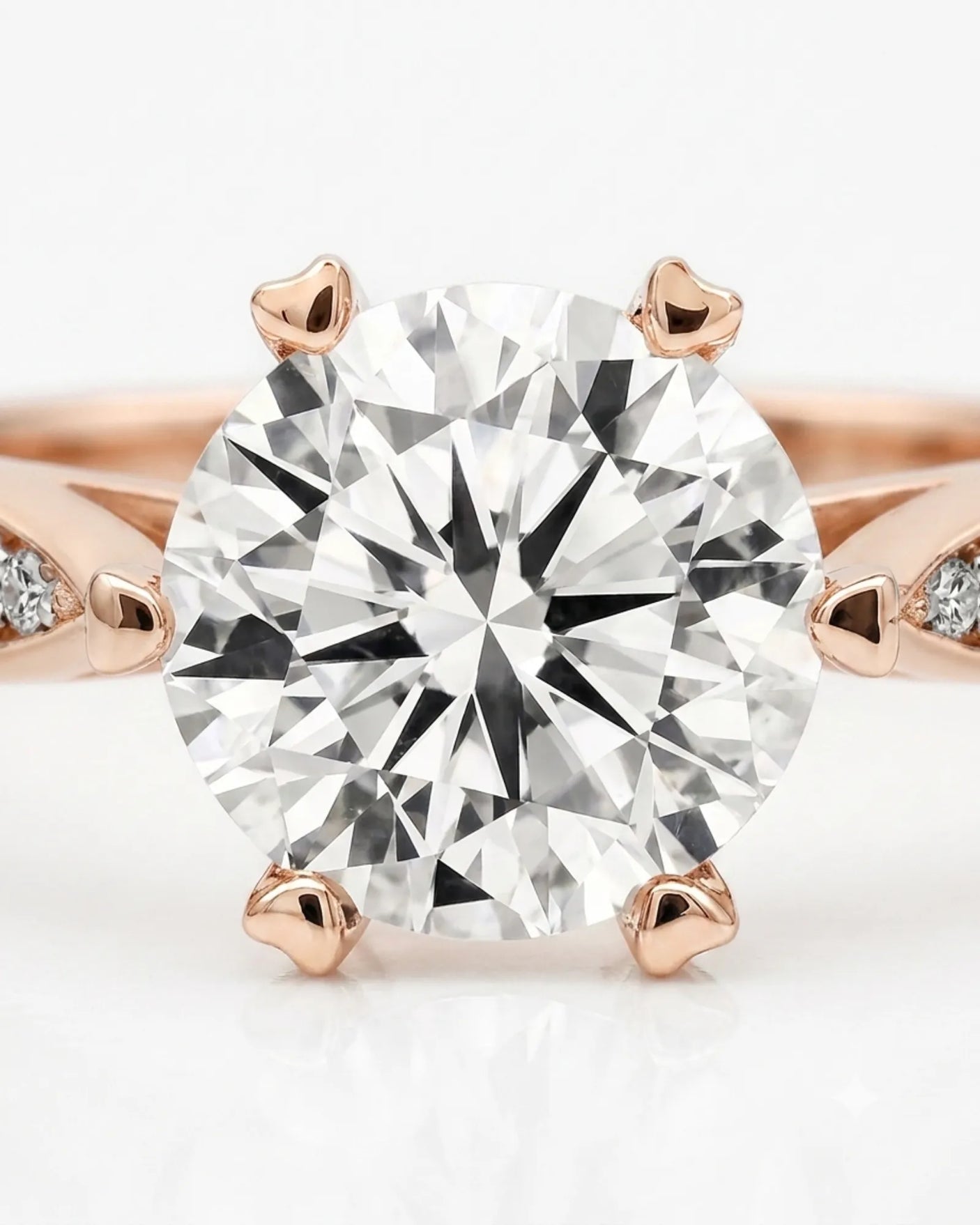 Colorless moissanite center with delicate pavé detailing in 18K rose gold | SARATTI
