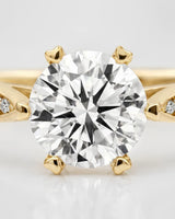 Colorless moissanite center with pavé accents in polished 18K yellow gold | SARATTI