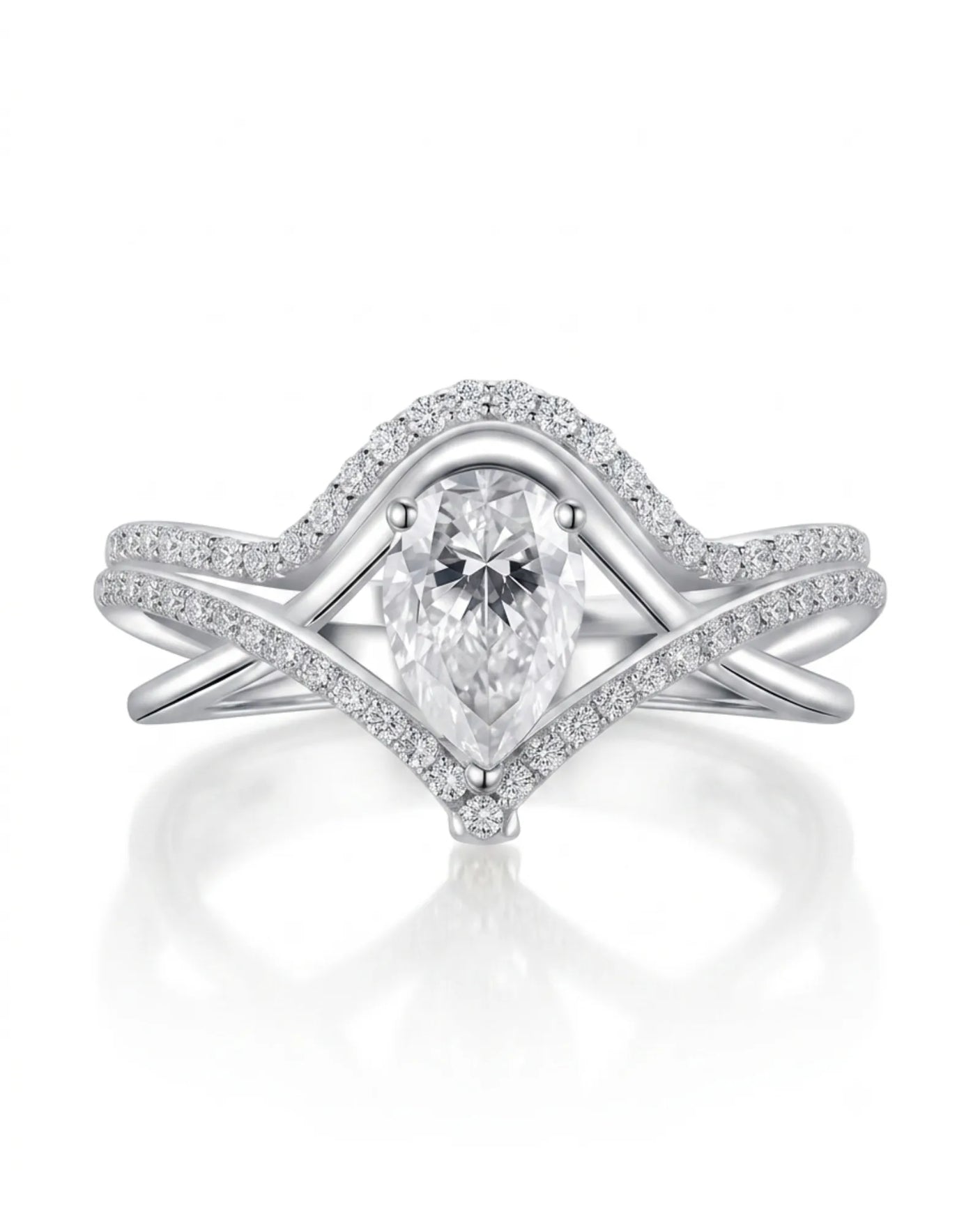Colorless pear-shaped moissanite center framed by brilliant round accent stones in enduring platinum | SARATTI