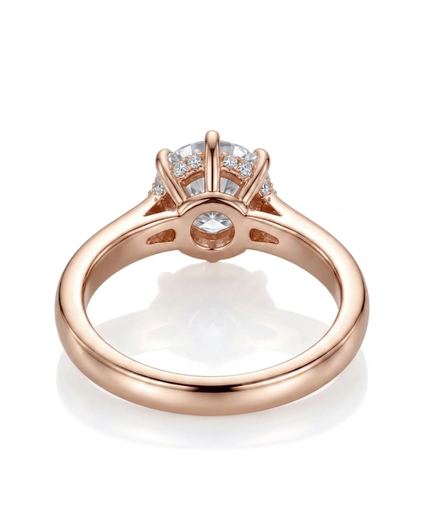 Colorless round moissanite framed by an eight-prong rose gold flower-inspired crown | SARATTI