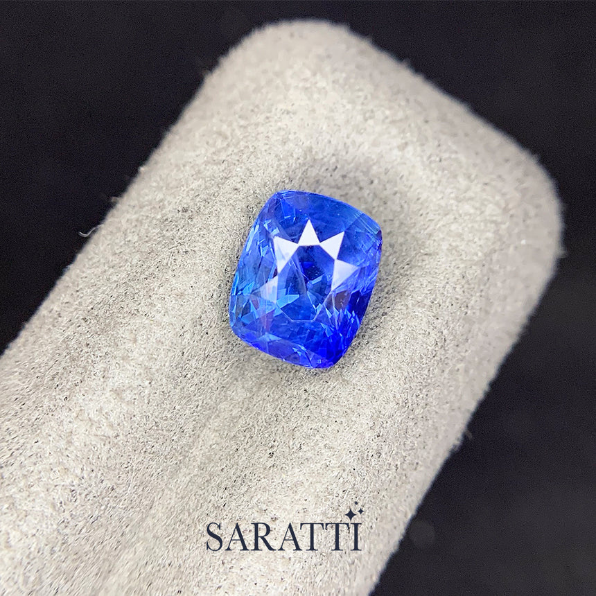 Cornflower Blue Natural sapphire cushion displaying strong brilliance | SARATTI 