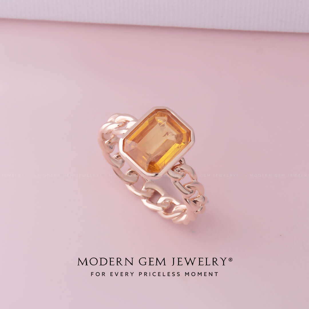 Timeless Emerald Cut Orange Sapphire Bezel Set Ring | Modern Gem Jewelry | Saratti