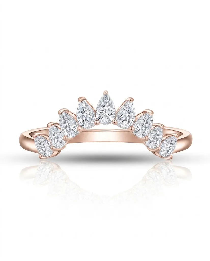 Curved tiara wedding ring with prong-set pear diamonds creating a crown silhouette in 18K rose gold | SARATTI