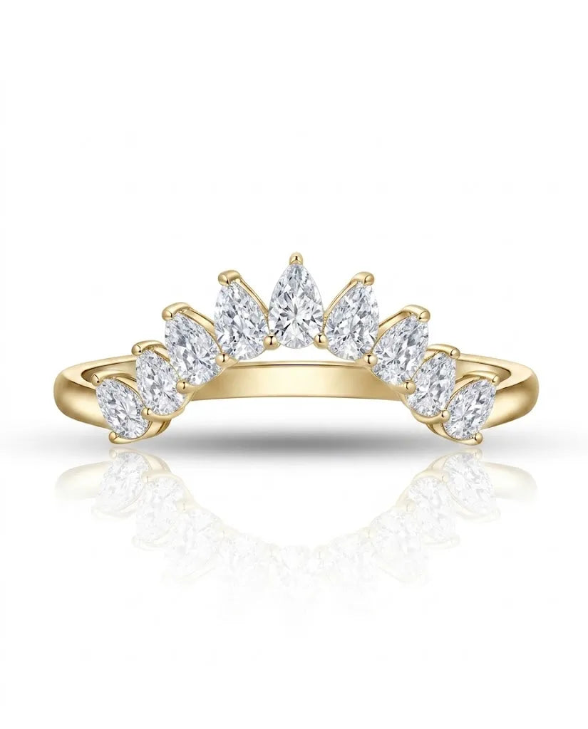 Curved tiara wedding ring with prong-set pear diamonds creating a crown silhouette in 18K yellow gold | SARATTI