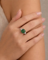 Cushion-cut green tourmaline ring with round diamond accents in elegant 18K white gold | SARATTI