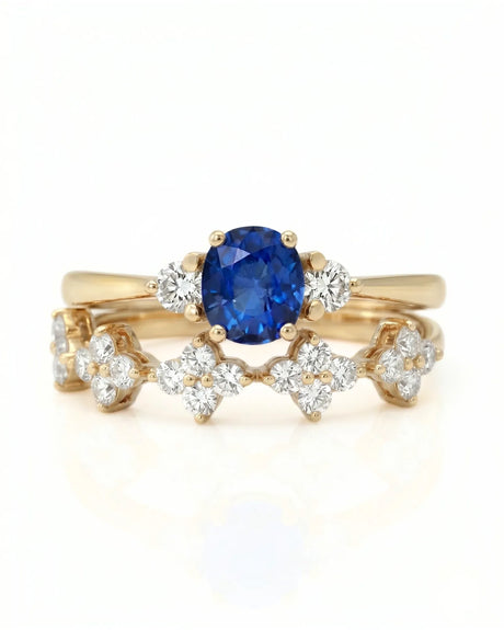 Cushion blue sapphire ring with diamond side stones and matching band in 18K yellow gold | SARATTI