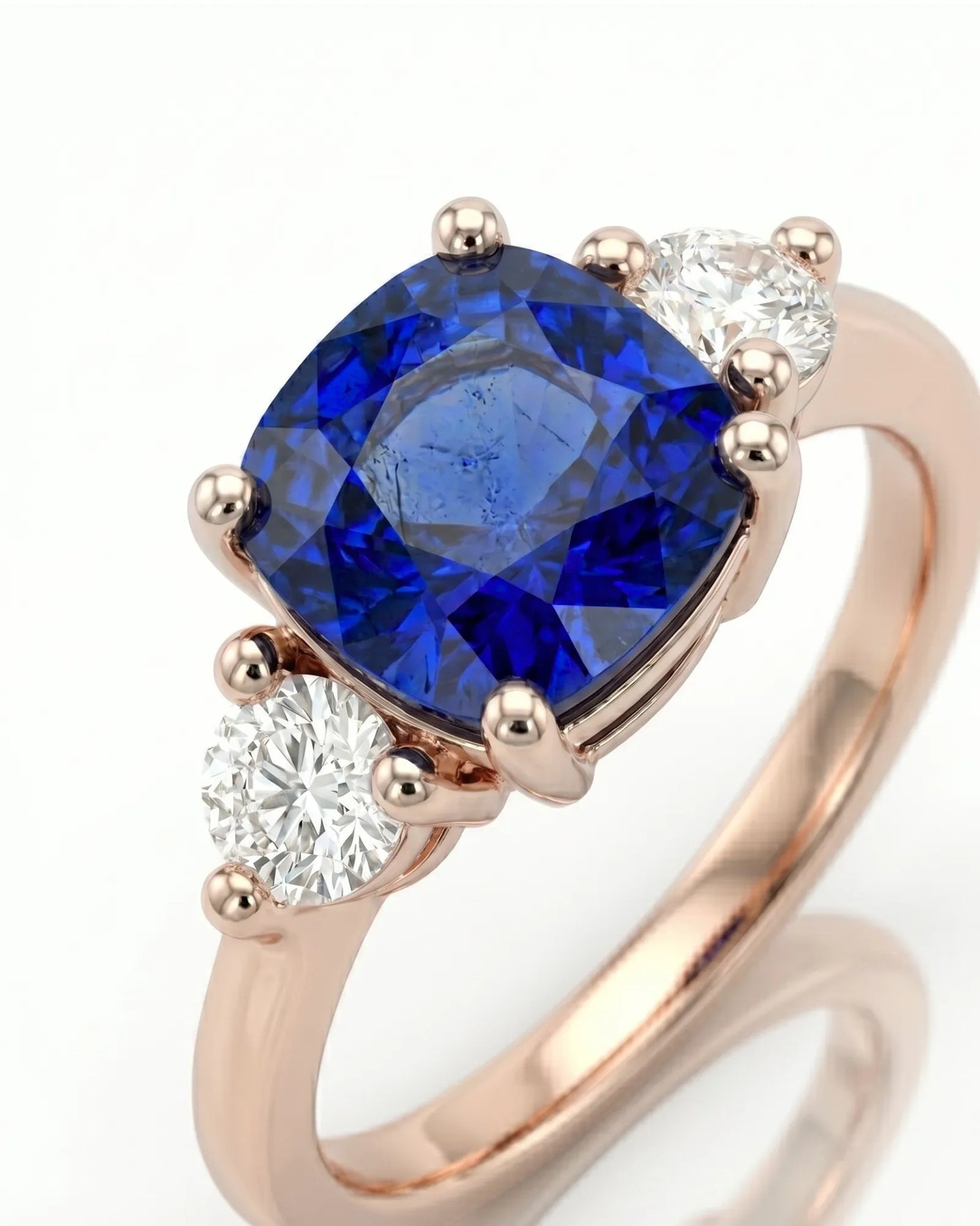 Lueur Triade cushion sapphire three-stone setting in rose gold | SARATTI