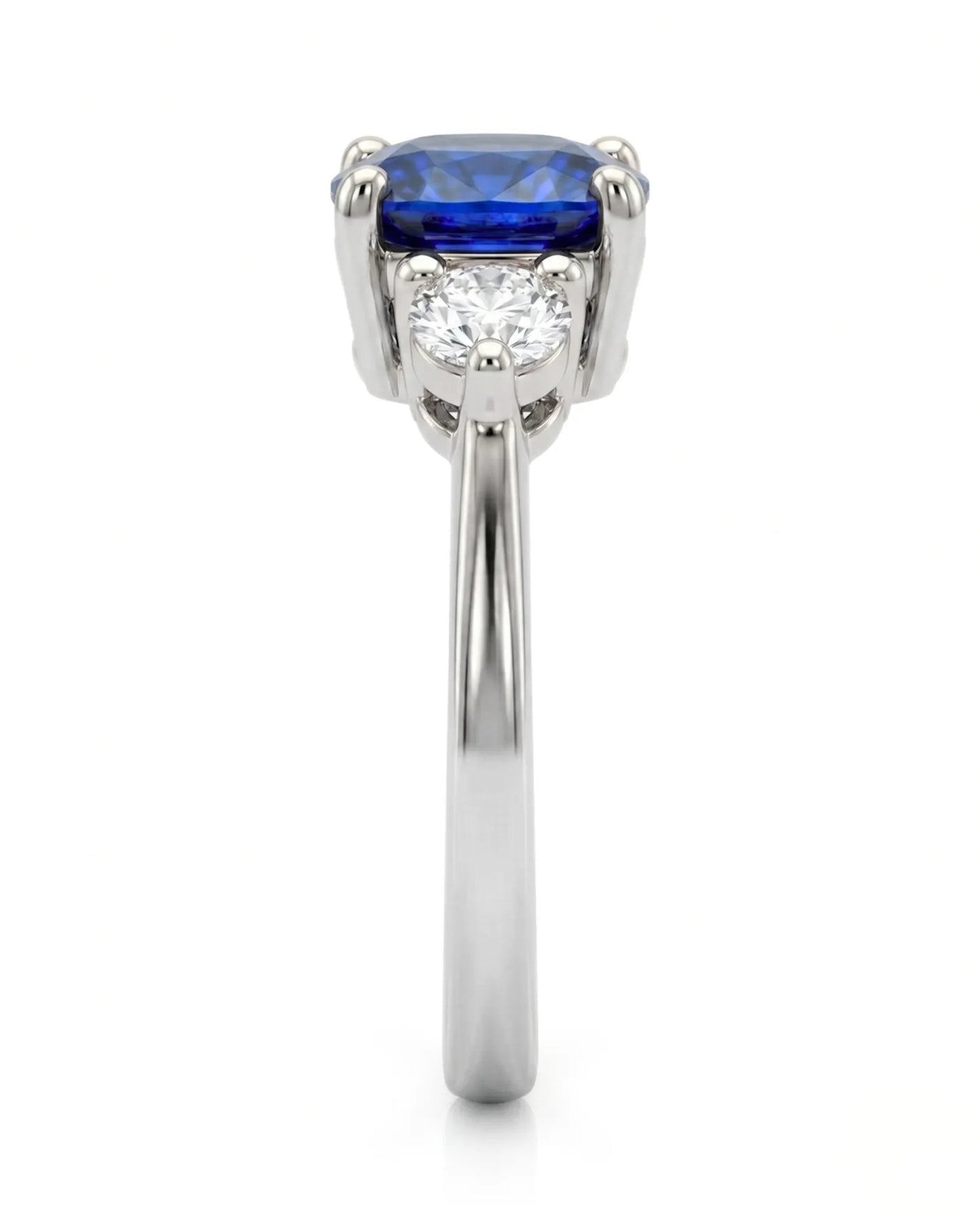 Cushion blue sapphire ring with two round diamonds in platinum - SARATTI
