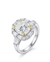 Cushion cut moissanite engagement ring with baguette halo and round accents in two tone | SARATTI