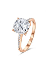 Cushion cut moissanite engagement ring with pavé side stones in rose gold | SARATTI