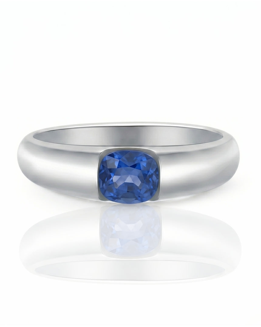 Cushion cut sapphire ring in platinum for refined engagement or anniversary gifting | SARATTI