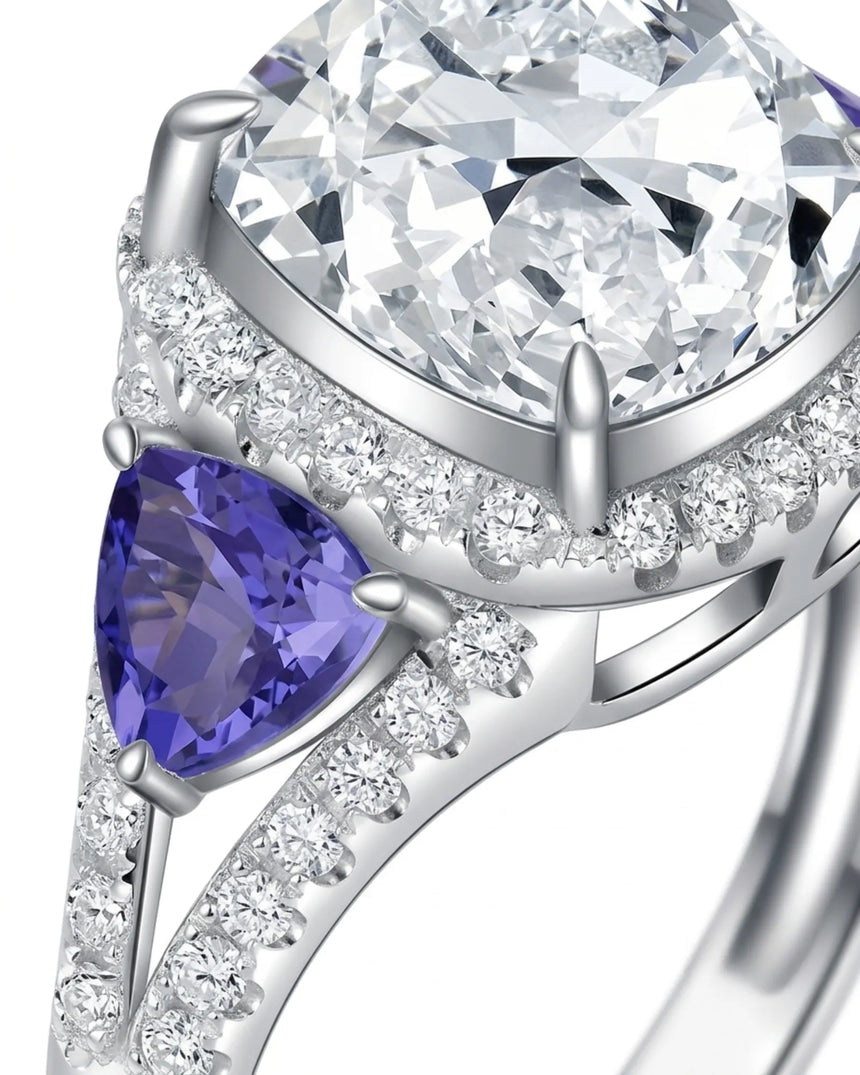 Cushion moissanite center stone ring with trillion tanzanites in white gold | SARATTI
