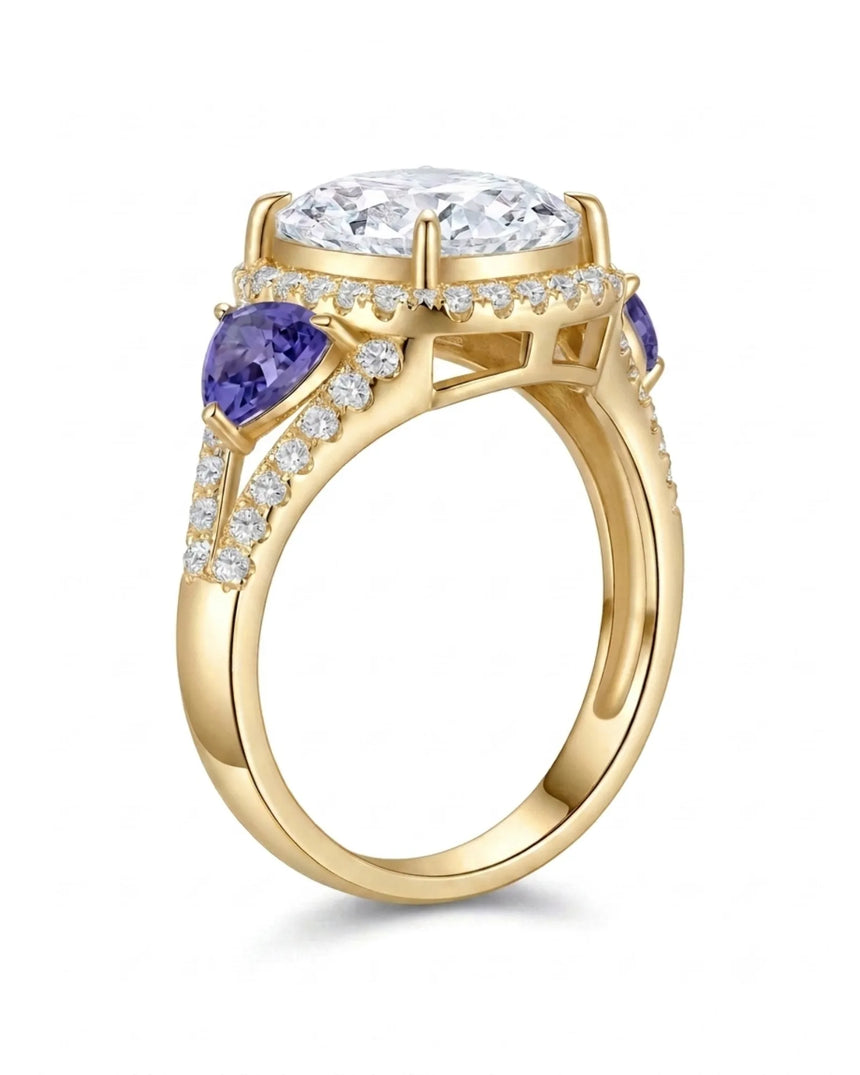 Cushion moissanite center stone ring with trillion tanzanites in yellow gold | SARATTI