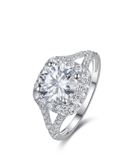 Cushion moissanite engagement ring with halo accents and pavé split shank in 18K white gold | SARATTI