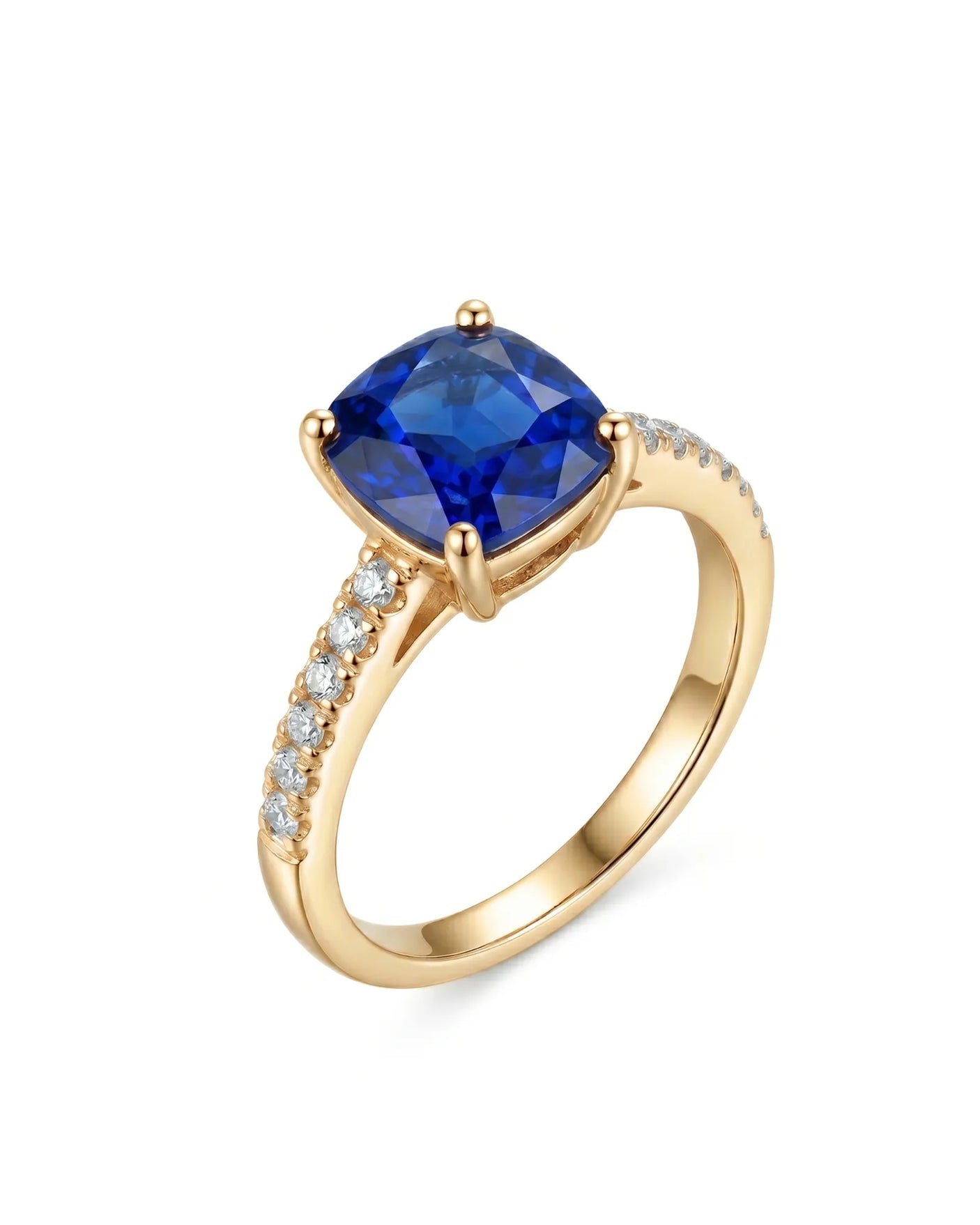 Cushion royal blue sapphire ring with pavé diamond band in 18K yellow gold | SARATTI