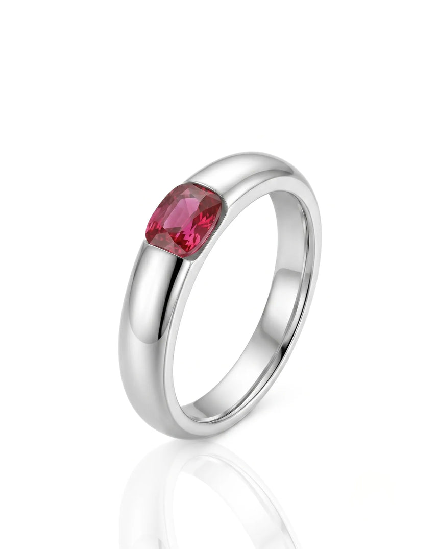 Cushion ruby ring with modern tension setting in polished platinum | SARATTI