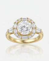D color cushion moissanite framed by baguette and round side stones in 18K yellow gold | SARATTI