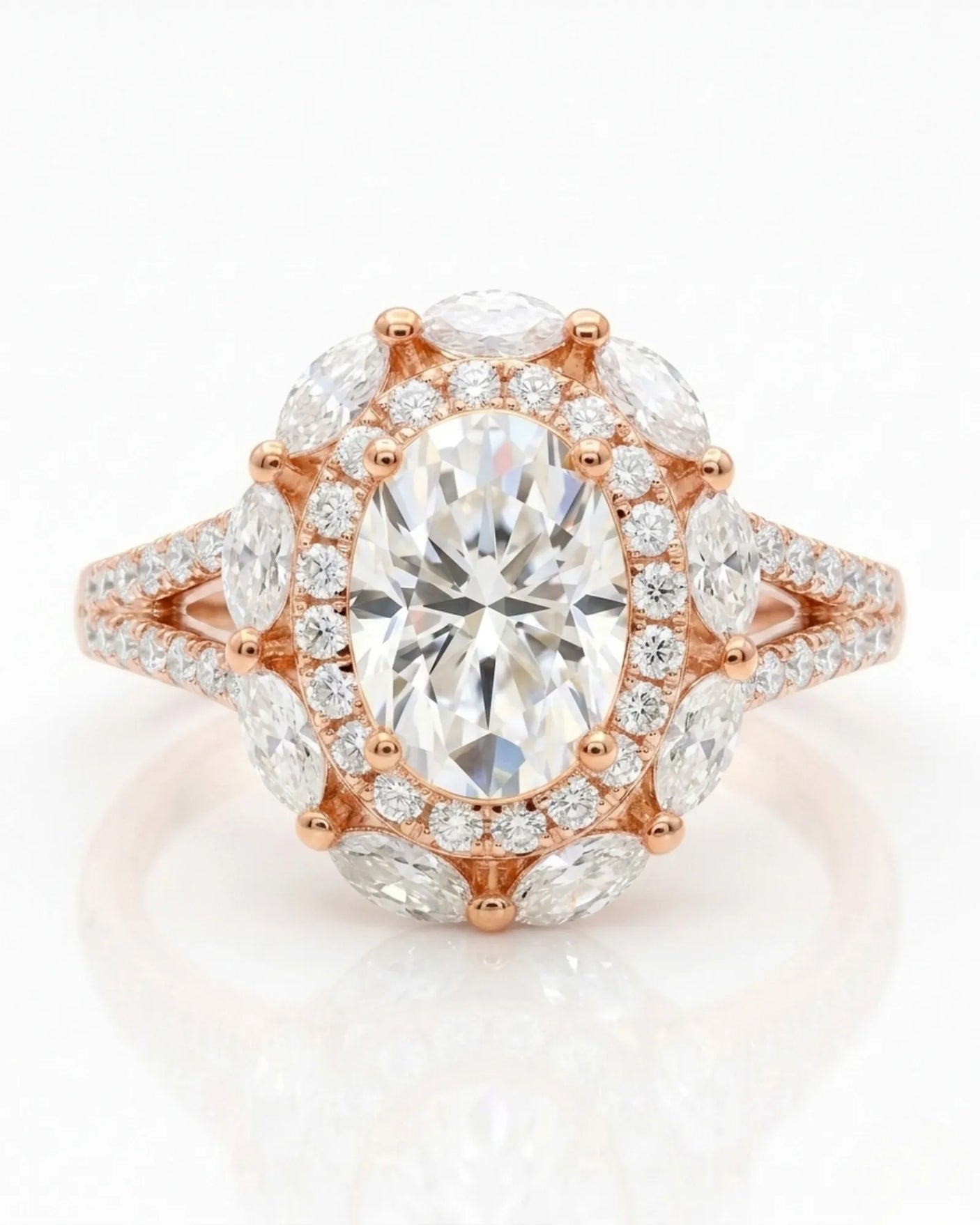 D color oval moissanite center framed by round and marquise stones in 18K rose gold | SARATTI