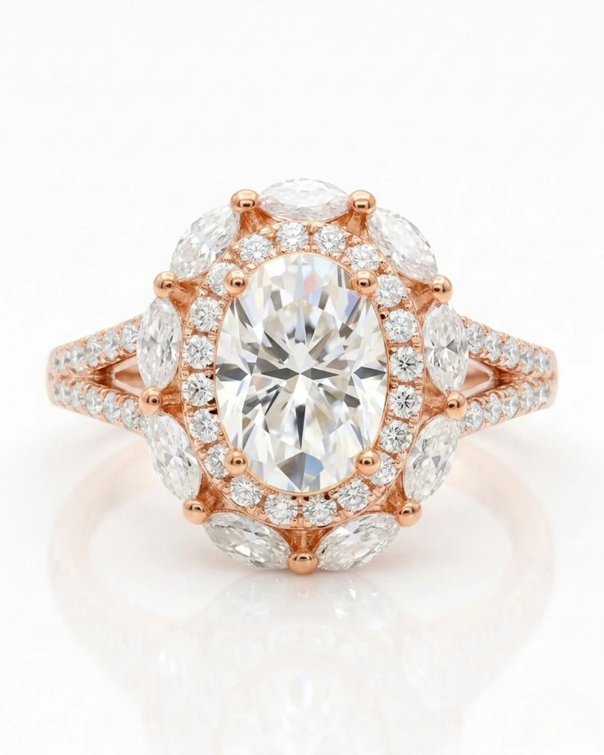 D color oval moissanite center framed by round and marquise stones in 18K rose gold | SARATTI