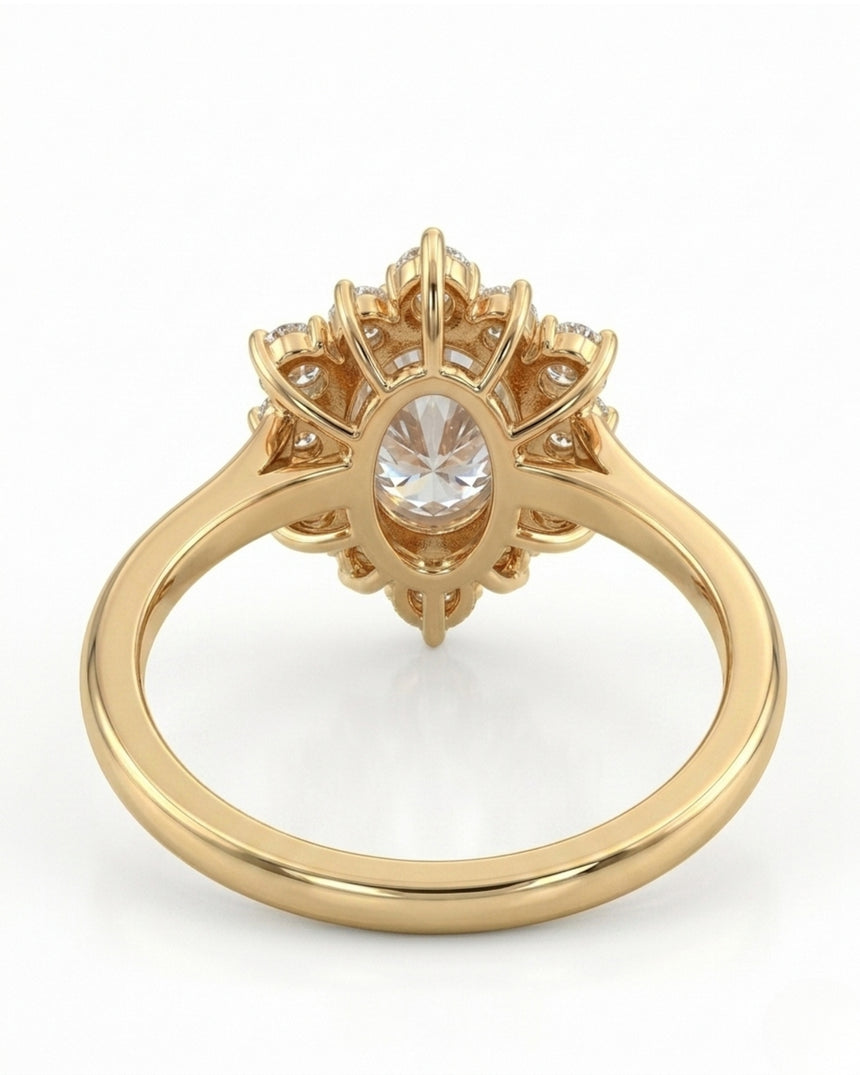 D color oval moissanite framed by round moissanite stones in polished 18K yellow gold | SARATTI