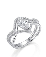 D color pear-shaped moissanite center framed by round accent stones in polished 18K white gold | SARATTI