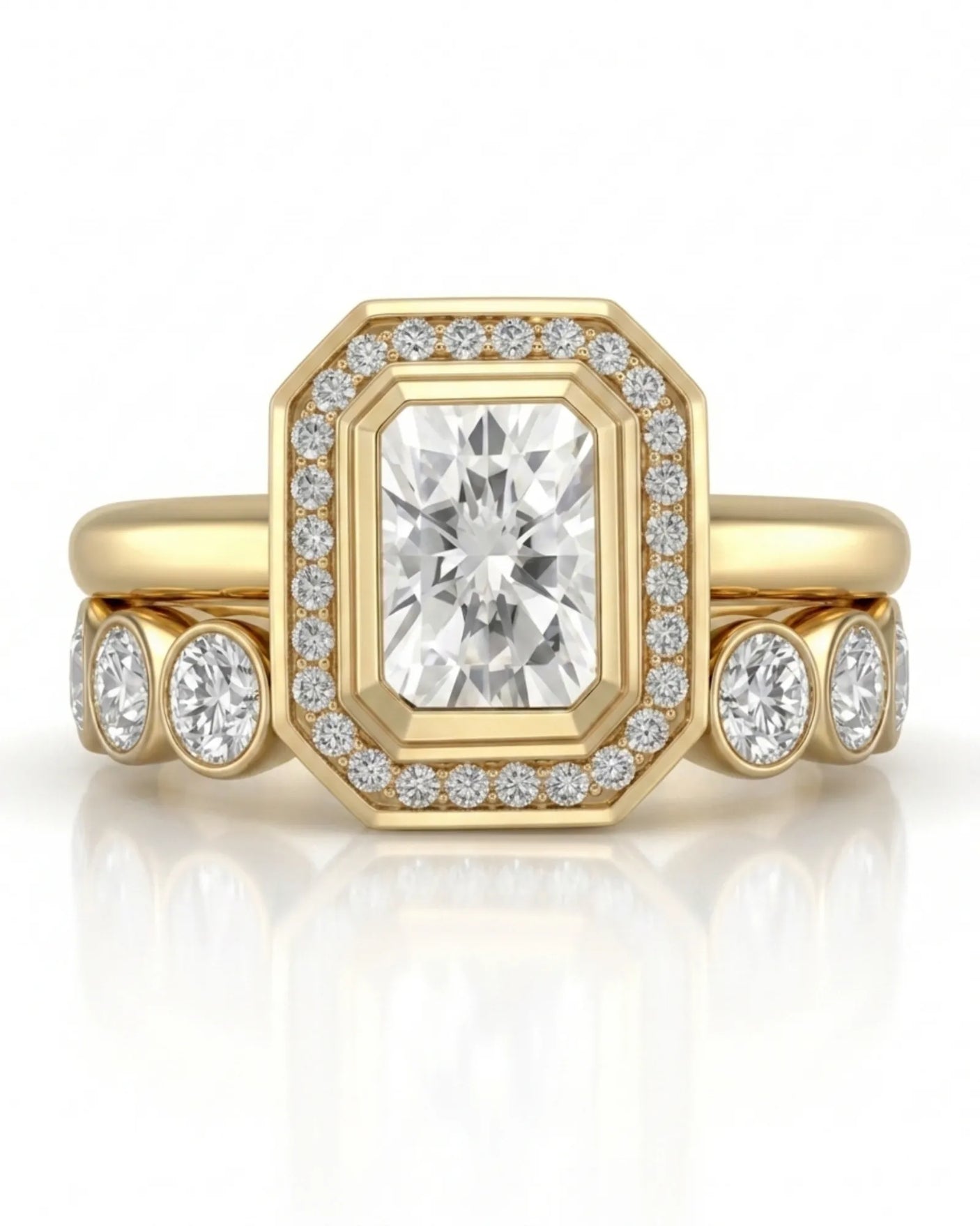 D color radiant moissanite center framed by round moissanite accents in polished 18K yellow gold | SARATTI
